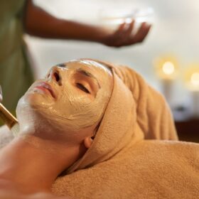 Only the best for perfect skin. Shot of a young woman receiving a beauty treatment in a spa.